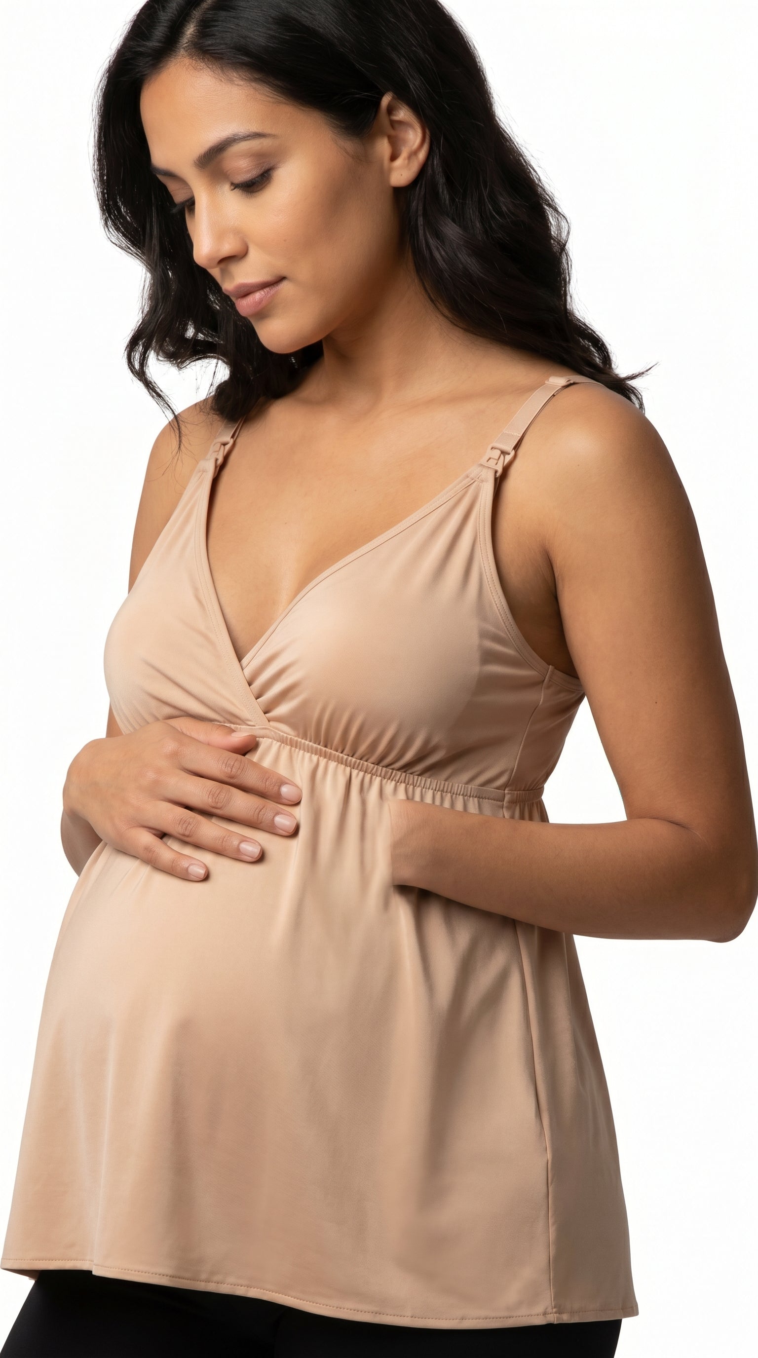 Pregnant woman wearing ChicVest™ maternity sling vest, bump-friendly fit